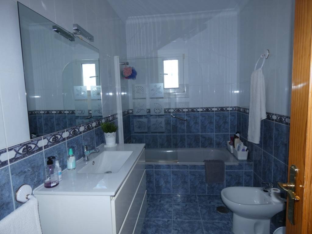 Practical and comfortable 3 bedrooms 2 bathrooms porch and large garden plus terrace with views of the sea and (pool)
