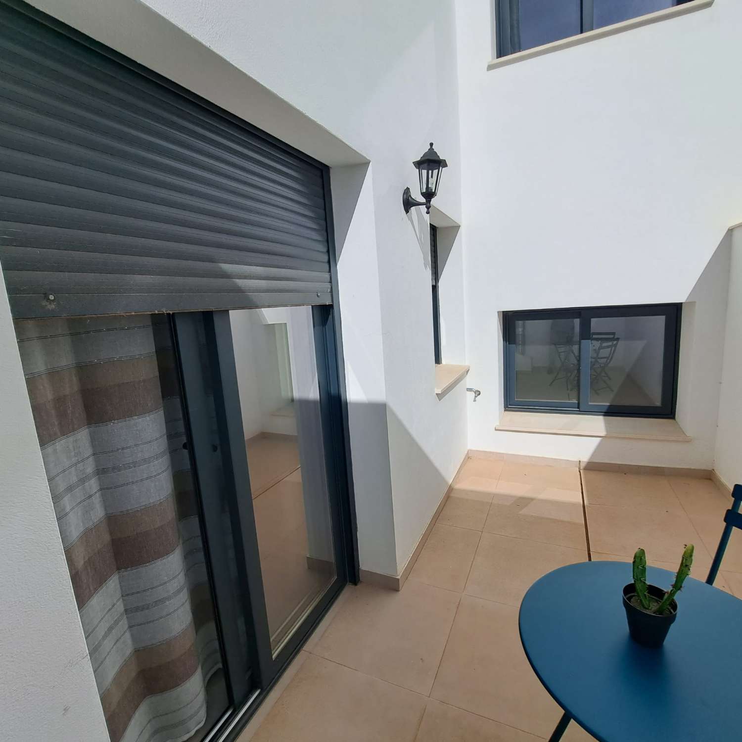 TWO BEDROOMS WITH PATIO AND STORAGE ROOM