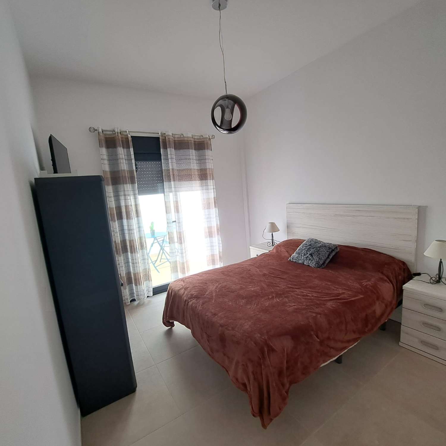 TWO BEDROOMS WITH PATIO AND STORAGE ROOM