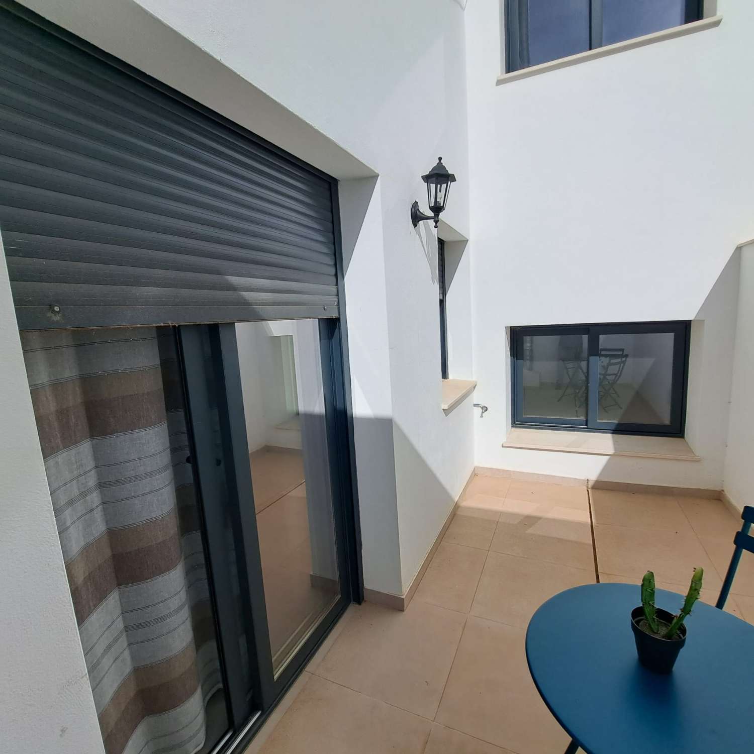TWO BEDROOMS WITH PATIO AND STORAGE ROOM