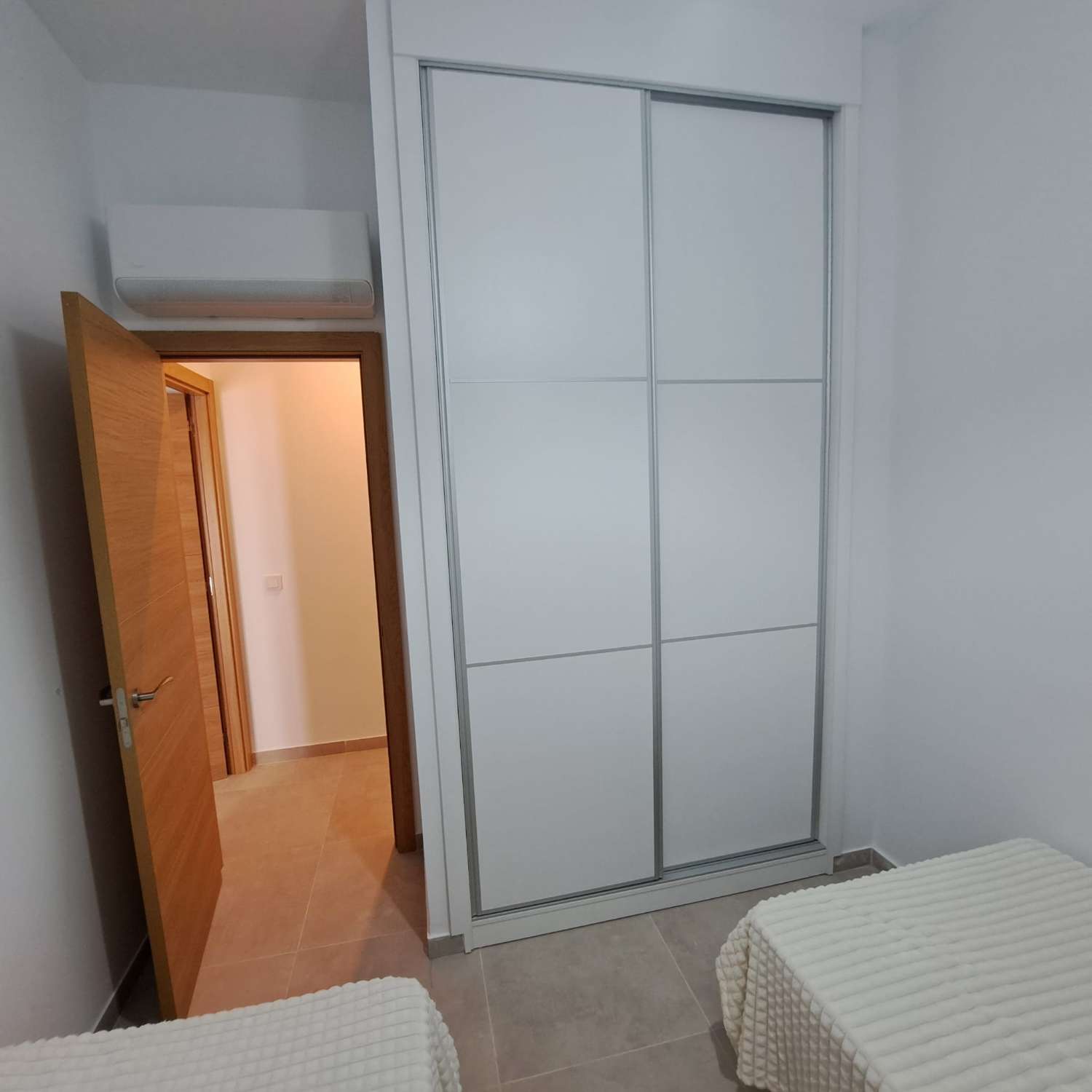 TWO BEDROOMS WITH PATIO AND STORAGE ROOM