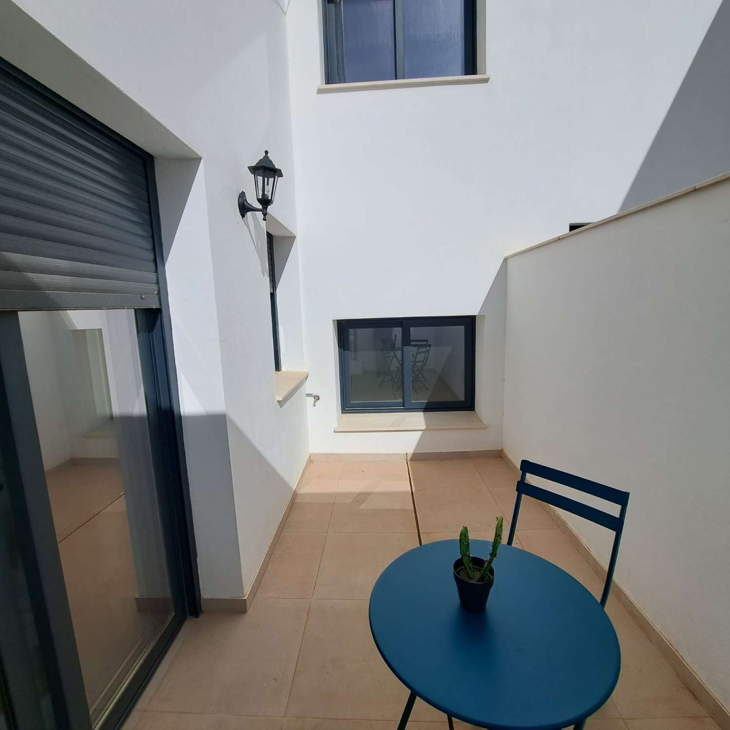 TWO BEDROOMS WITH PATIO AND STORAGE ROOM