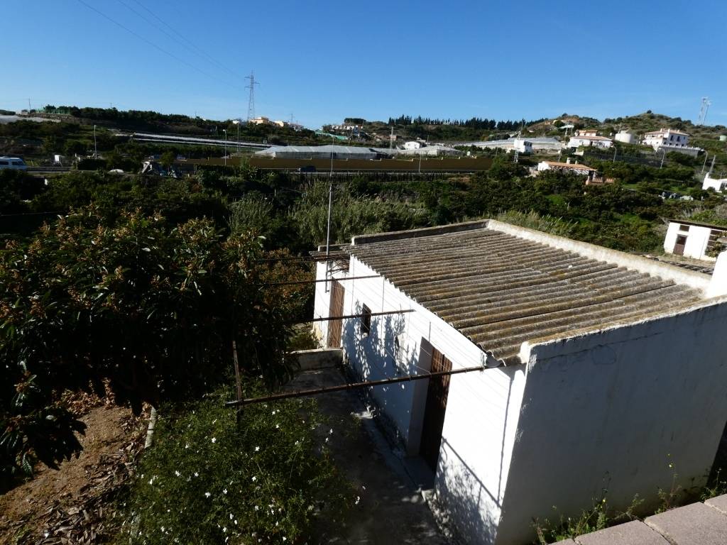 Ruined plot with tools in an exceptional location near the Torrox roundabout.