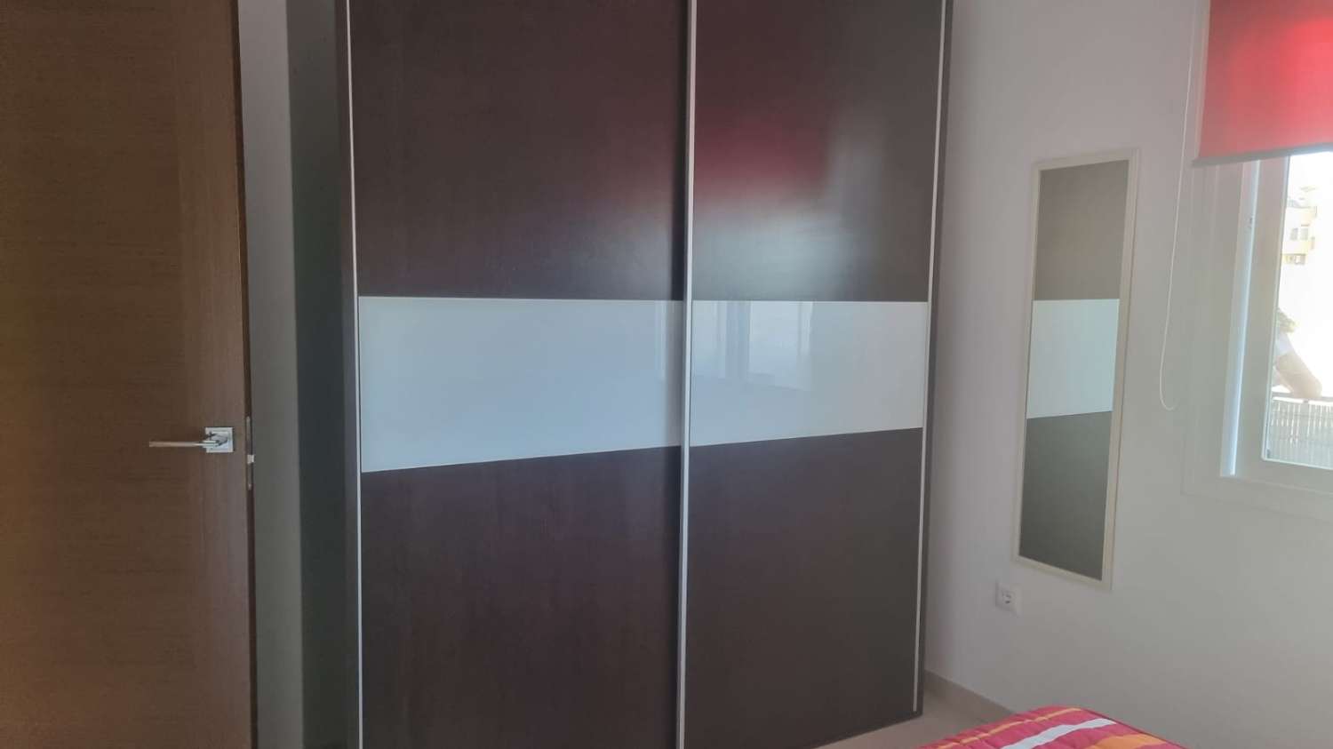 UN DORMITORIO MAS PARKING