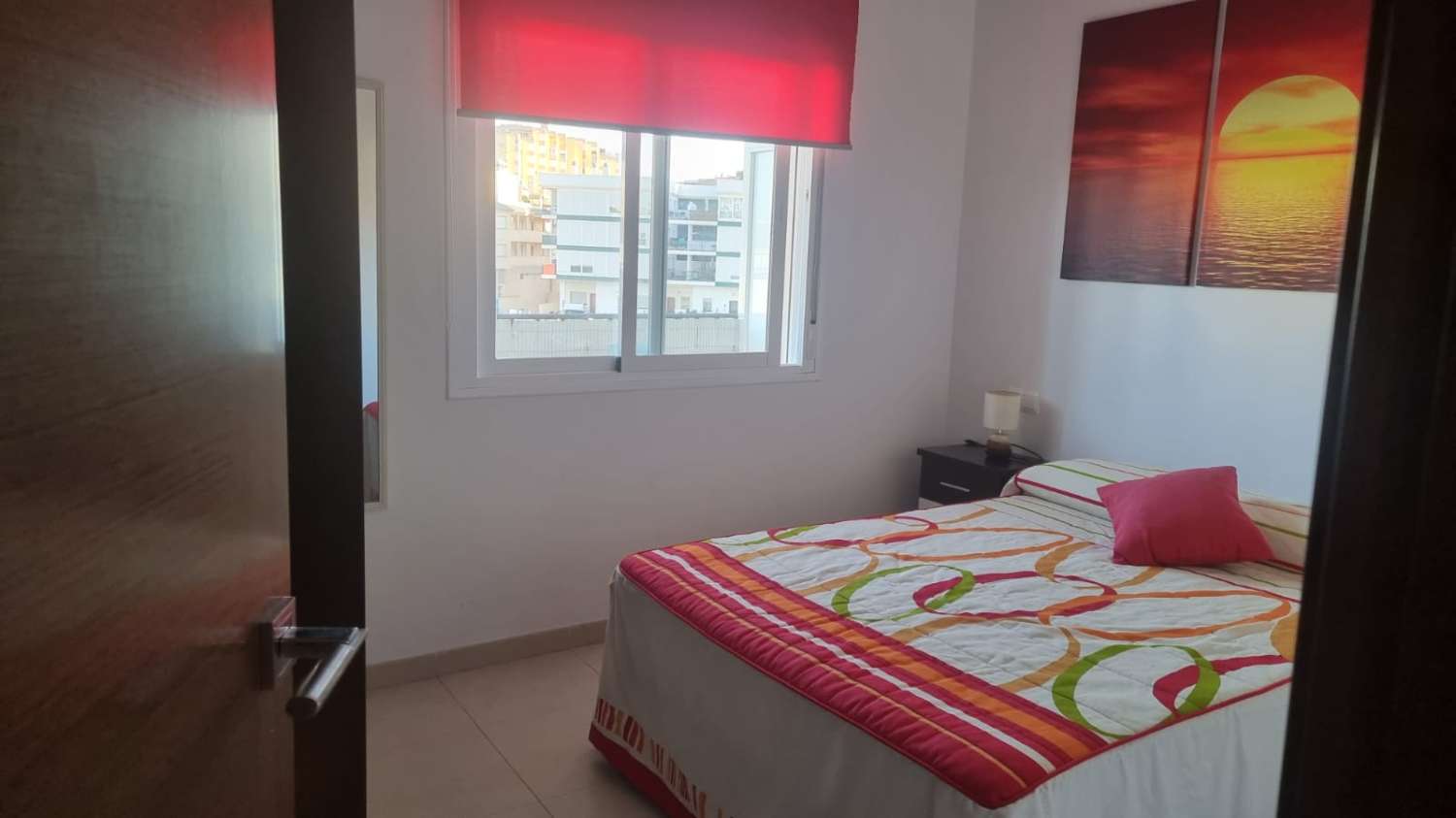 UN DORMITORIO MAS PARKING